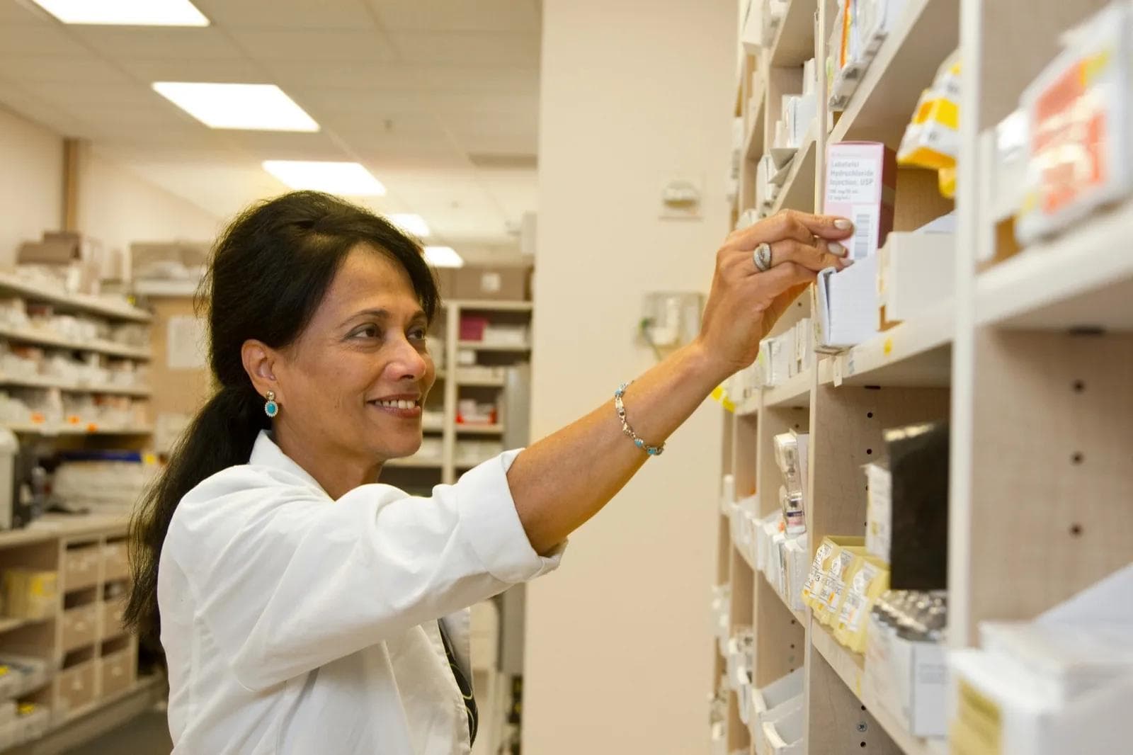 Pharmacist at the Bruntsfield Pharmacy counter in Edinburgh