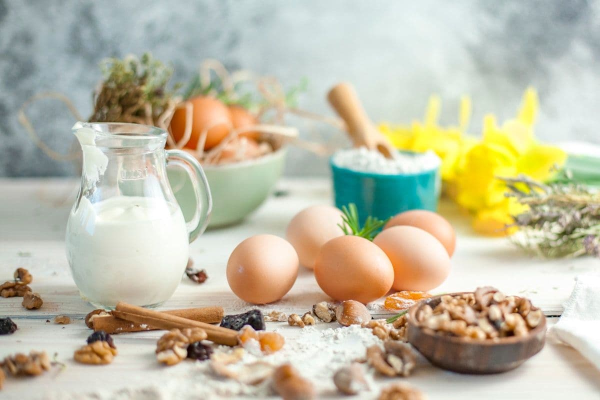 Eggs and a glass of milk on a table