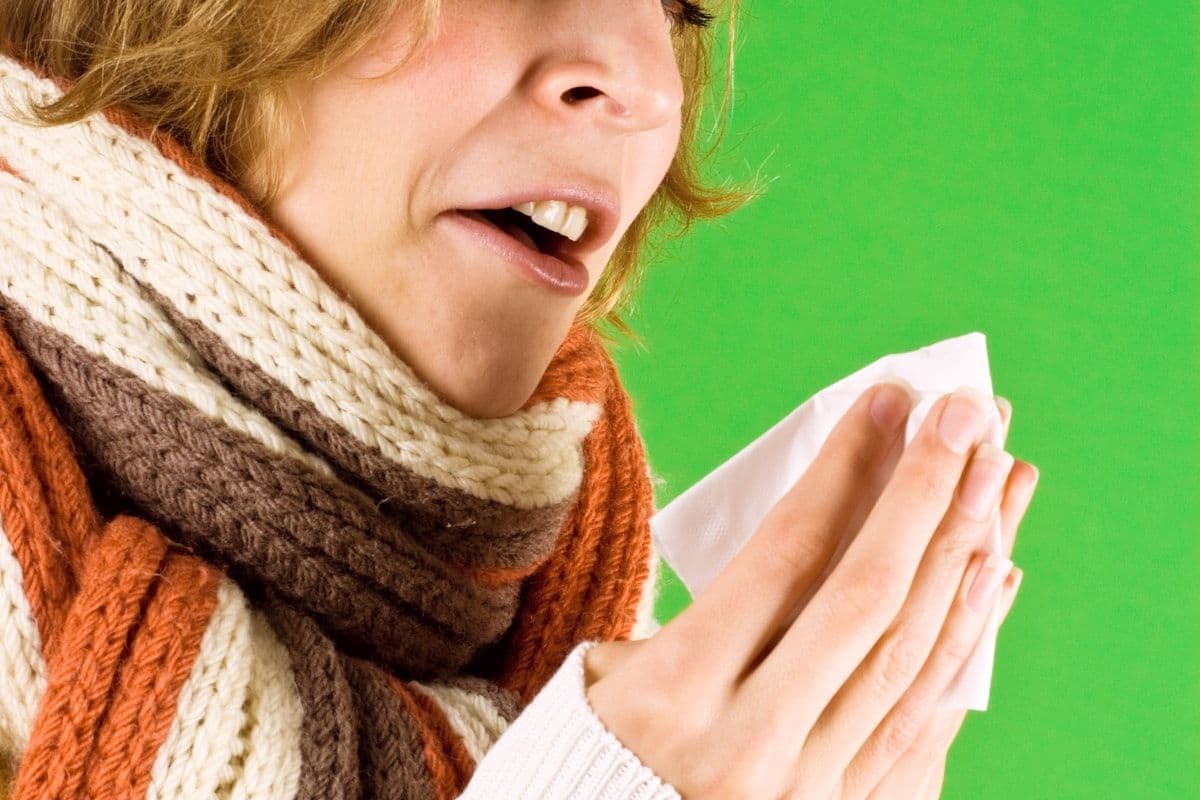 A woman wrapped in a scarf around her neck